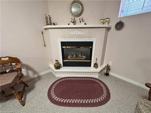 28-121 Glen Morris Drive, St. Catharines, ON - Indoor With Fireplace