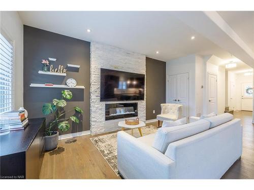27 Harmony Way, Thorold, ON - Indoor Photo Showing Living Room With Fireplace