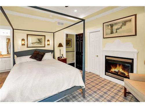 619 King Street, Niagara-On-The-Lake, ON - Indoor Photo Showing Bedroom With Fireplace