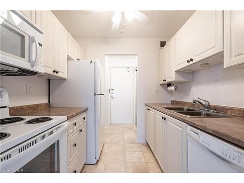 507-365 Geneva Street, St. Catharines, ON - Indoor Photo Showing Kitchen With Double Sink