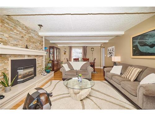 16 Lantana Circle, St. Catharines, ON - Indoor Photo Showing Living Room With Fireplace