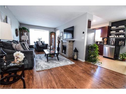 4974 Windgate Drive, Niagara Falls, ON - Indoor Photo Showing Living Room With Fireplace