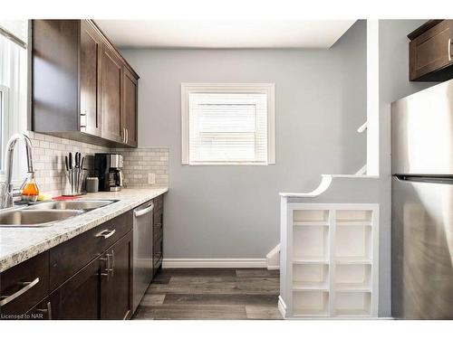 1-6413 Frederica Street, Niagara Falls, ON - Indoor Photo Showing Kitchen With Double Sink