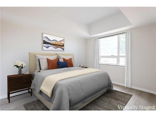 407-3998 Victoria Avenue, Vineland, ON - Indoor Photo Showing Bedroom