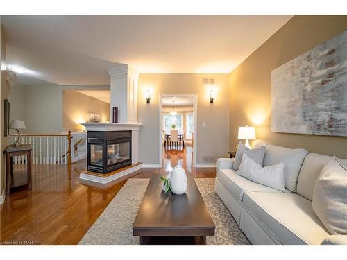 8-27 Parnell Road, St. Catharines, ON - Indoor Photo Showing Living Room With Fireplace