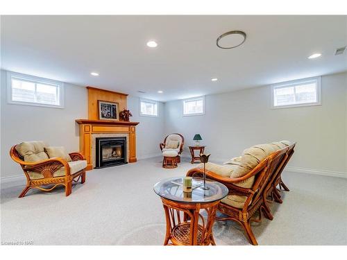 8143 Westminster Drive, Niagara Falls, ON - Indoor Photo Showing Basement With Fireplace