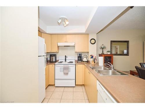 1314-330 Prince Charles Drive S, Welland, ON - Indoor Photo Showing Kitchen With Double Sink