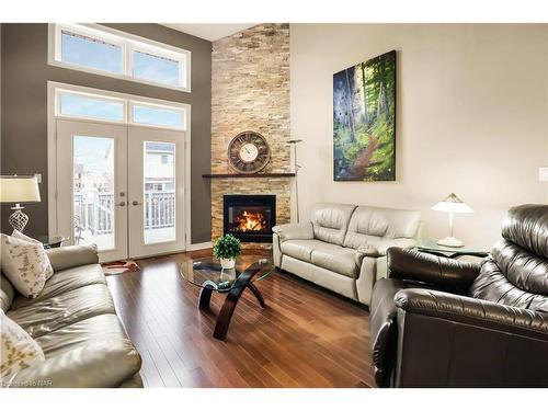 1-409 Niagara Street, St. Catharines, ON - Indoor Photo Showing Living Room With Fireplace