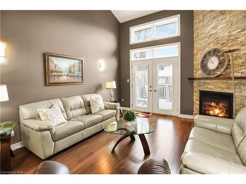 1-409 Niagara Street, St. Catharines, ON - Indoor Photo Showing Living Room With Fireplace