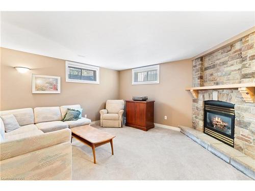 410 Jasmine Court, Fort Erie, ON - Indoor Photo Showing Living Room With Fireplace