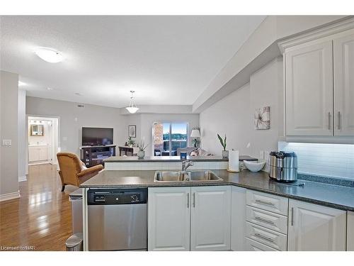 523-8111 Forest Glen Drive, Niagara Falls, ON - Indoor Photo Showing Kitchen With Double Sink