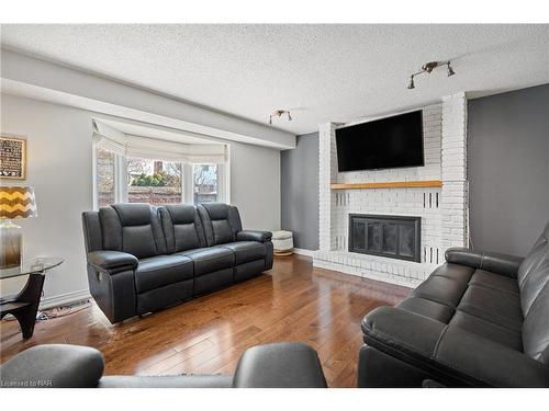 66 Courtleigh Road, St. Catharines, ON - Indoor Photo Showing Living Room With Fireplace