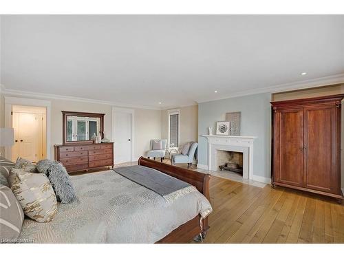 35 Clearview Heights, St. Catharines, ON - Indoor Photo Showing Bedroom With Fireplace