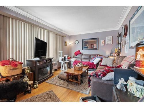 496 Carlton Street, St. Catharines, ON - Indoor Photo Showing Living Room With Fireplace