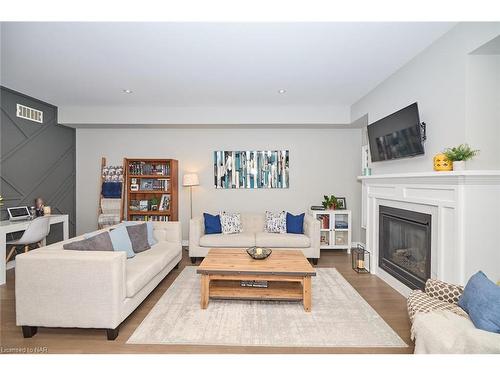 146 Lametti Drive, Fonthill, ON - Indoor Photo Showing Living Room With Fireplace
