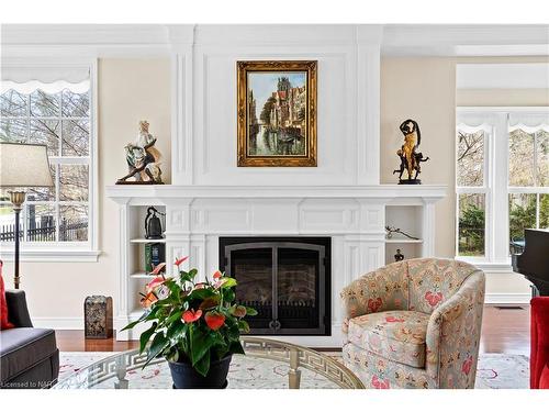 1-175 Queen Street, Niagara-On-The-Lake, ON - Indoor Photo Showing Living Room With Fireplace