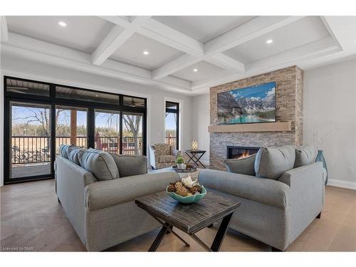 C Rathfon Road, Wainfleet, ON - Indoor Photo Showing Living Room With Fireplace