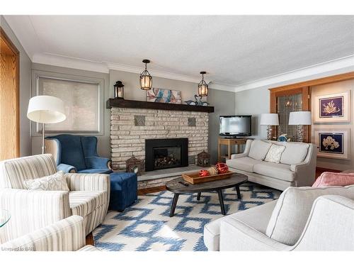 10417 Lakeshore Road, Wainfleet, ON - Indoor Photo Showing Living Room With Fireplace