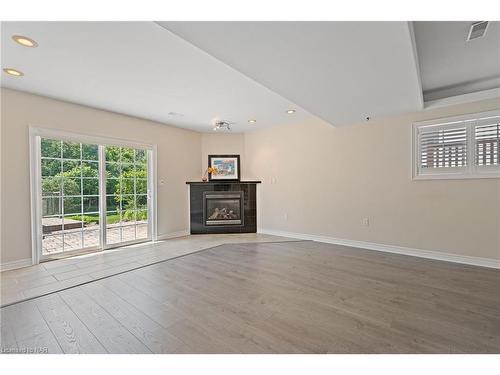 7834 Charnwood Avenue, Niagara Falls, ON - Indoor Photo Showing Other Room With Fireplace
