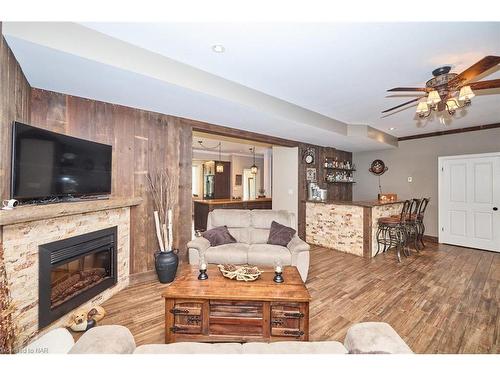 9695 Grassy Brook Road, Niagara Falls, ON - Indoor Photo Showing Living Room With Fireplace