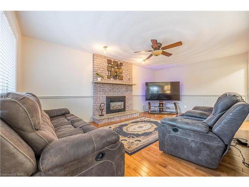 8 Donalda Court, St. Catharines, ON - Indoor Photo Showing Living Room With Fireplace