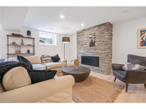 1007 Clare Avenue, Fonthill, ON - Indoor Photo Showing Living Room With Fireplace
