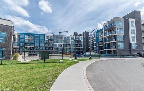 207-10 Concord Place, Grimsby, ON - Outdoor With Balcony With Facade
