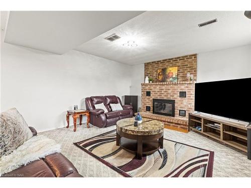 87 College Park Drive, Welland, ON - Indoor Photo Showing Living Room With Fireplace