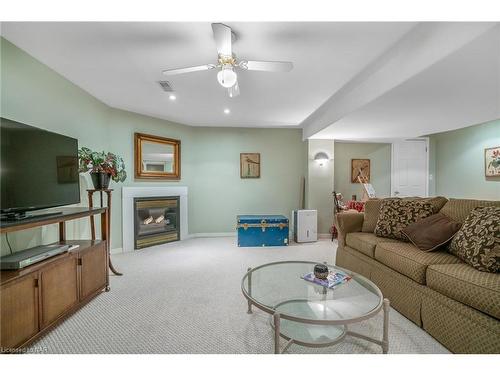 2 Bolger Drive, St. Catharines, ON - Indoor Photo Showing Living Room With Fireplace