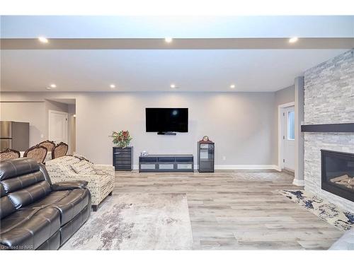 1174 Spears Road Road, Fort Erie, ON - Indoor Photo Showing Living Room With Fireplace