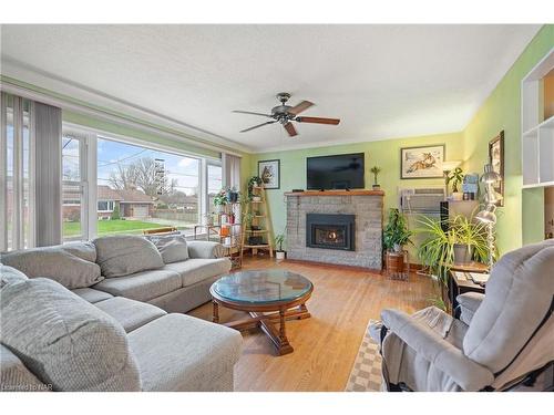6018 Carman Street, Niagara Falls, ON - Indoor Photo Showing Living Room With Fireplace