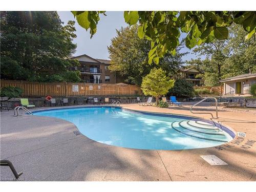 812-81 Scott Street, St. Catharines, ON - Outdoor With In Ground Pool With Backyard