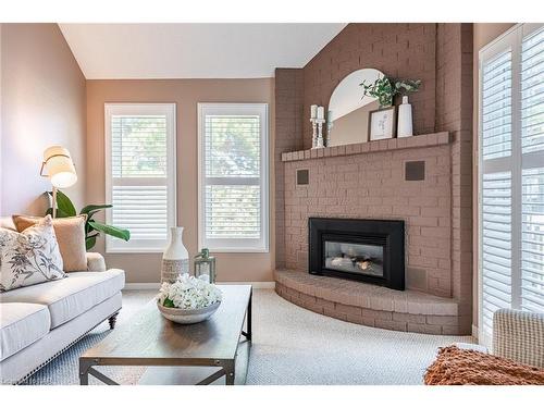 13-10 Elderwood Drive, St. Catharines, ON - Indoor Photo Showing Living Room With Fireplace