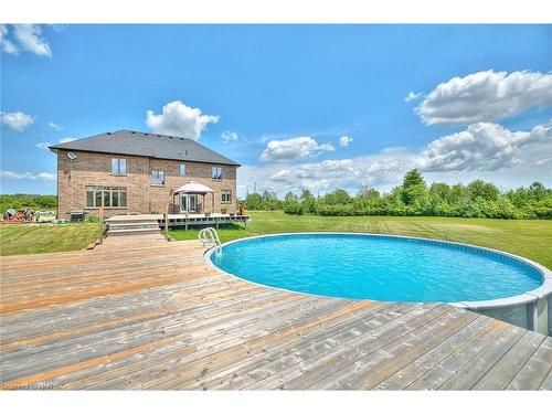 9812 Green Road, Caistor Centre, ON - Outdoor With Above Ground Pool With Deck Patio Veranda With Backyard