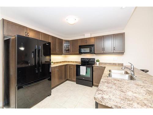 30 Woodburn Avenue, St. Catharines, ON - Indoor Photo Showing Kitchen With Double Sink