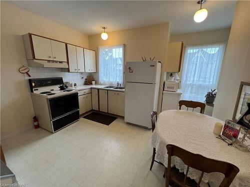 4-3 Welland Avenue, St. Catharines, ON - Indoor Photo Showing Kitchen With Double Sink