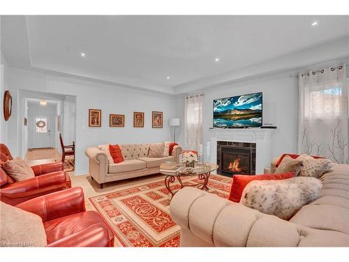 5632 Osprey Avenue, Niagara Falls, ON - Indoor Photo Showing Living Room With Fireplace