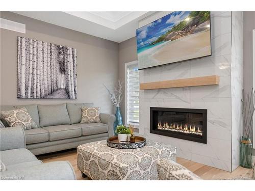 B Rathfon Road, Wainfleet, ON - Indoor Photo Showing Living Room With Fireplace