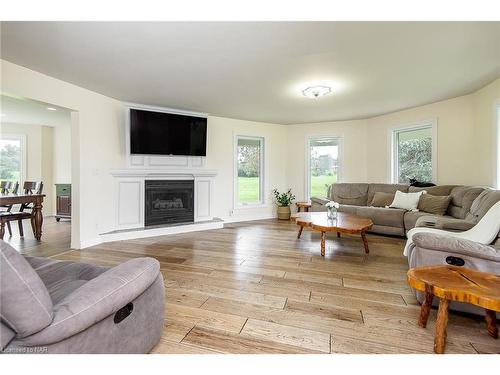 11553 3 Highway, Wainfleet, ON - Indoor Photo Showing Living Room With Fireplace