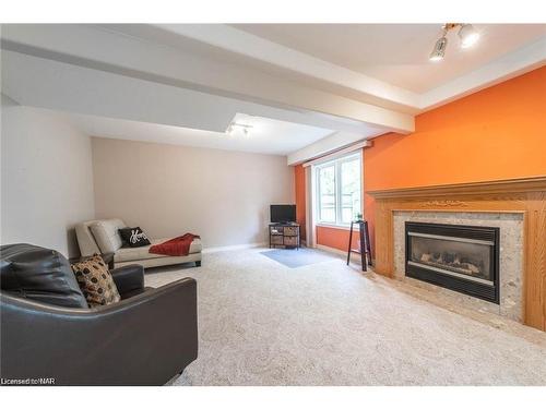 25-174 Martindale Road, St. Catharines, ON - Indoor Photo Showing Living Room With Fireplace