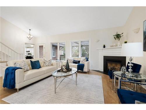 6839 Imperial Court, Niagara Falls, ON - Indoor Photo Showing Living Room With Fireplace