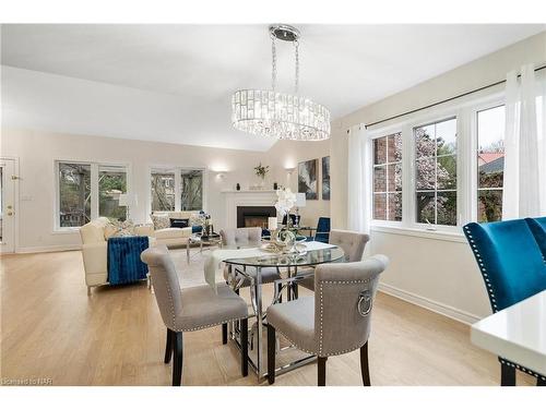 6839 Imperial Court, Niagara Falls, ON - Indoor Photo Showing Dining Room With Fireplace