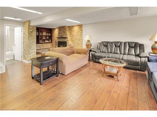 4934 Drake Avenue, Beamsville, ON - Indoor Photo Showing Living Room With Fireplace