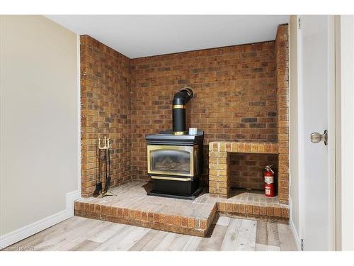 62 Whyte Avenue N, Thorold, ON - Indoor With Fireplace