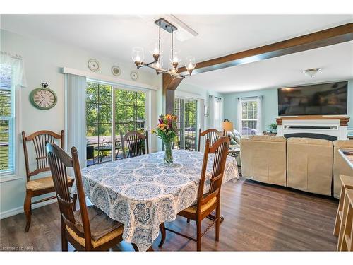 3545 Firelane 7, Port Colborne, ON - Indoor Photo Showing Dining Room With Fireplace