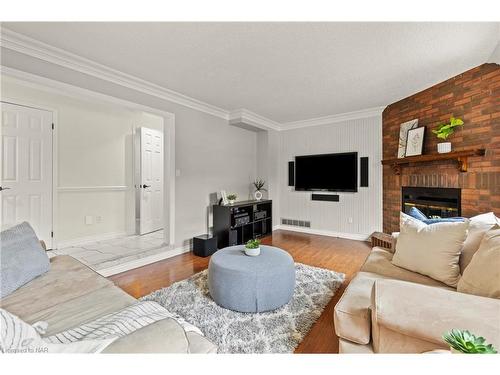 31 Bloomfield Trail, Richmond, ON - Indoor Photo Showing Living Room With Fireplace