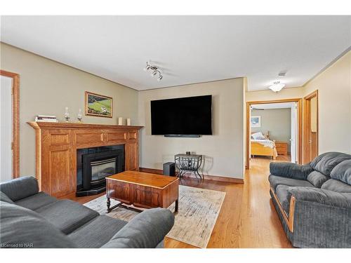 8350 Young Street, Grimsby, ON - Indoor Photo Showing Living Room With Fireplace