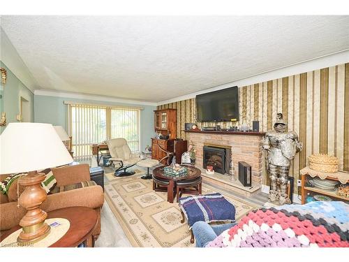 7205 Sharon Avenue, Niagara Falls, ON - Indoor Photo Showing Living Room With Fireplace