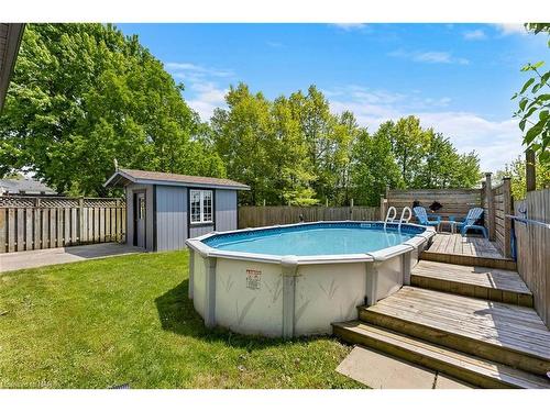 6840 Sunrise Court, Niagara Falls, ON - Outdoor With Above Ground Pool With Backyard