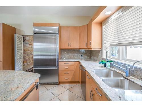 13 Jasmin Crescent, St. Catharines, ON - Indoor Photo Showing Kitchen With Double Sink